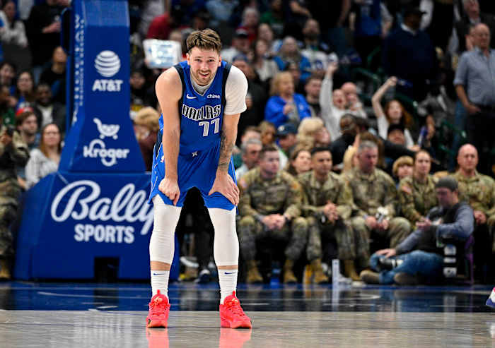 Jan 29, 2024; Dallas, Texas, USA; Dallas Mavericks guard Luka Doncic (77) waits for play to resume against the Orlando Magic during the second half at the American Airlines Center.